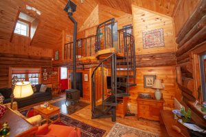 rustic log cabin interior real estate photo